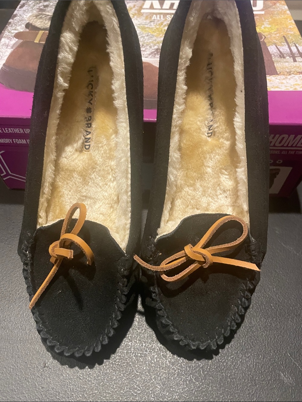 Cozy Black Faux-Suede Moccasin Slippers with Tan Bow